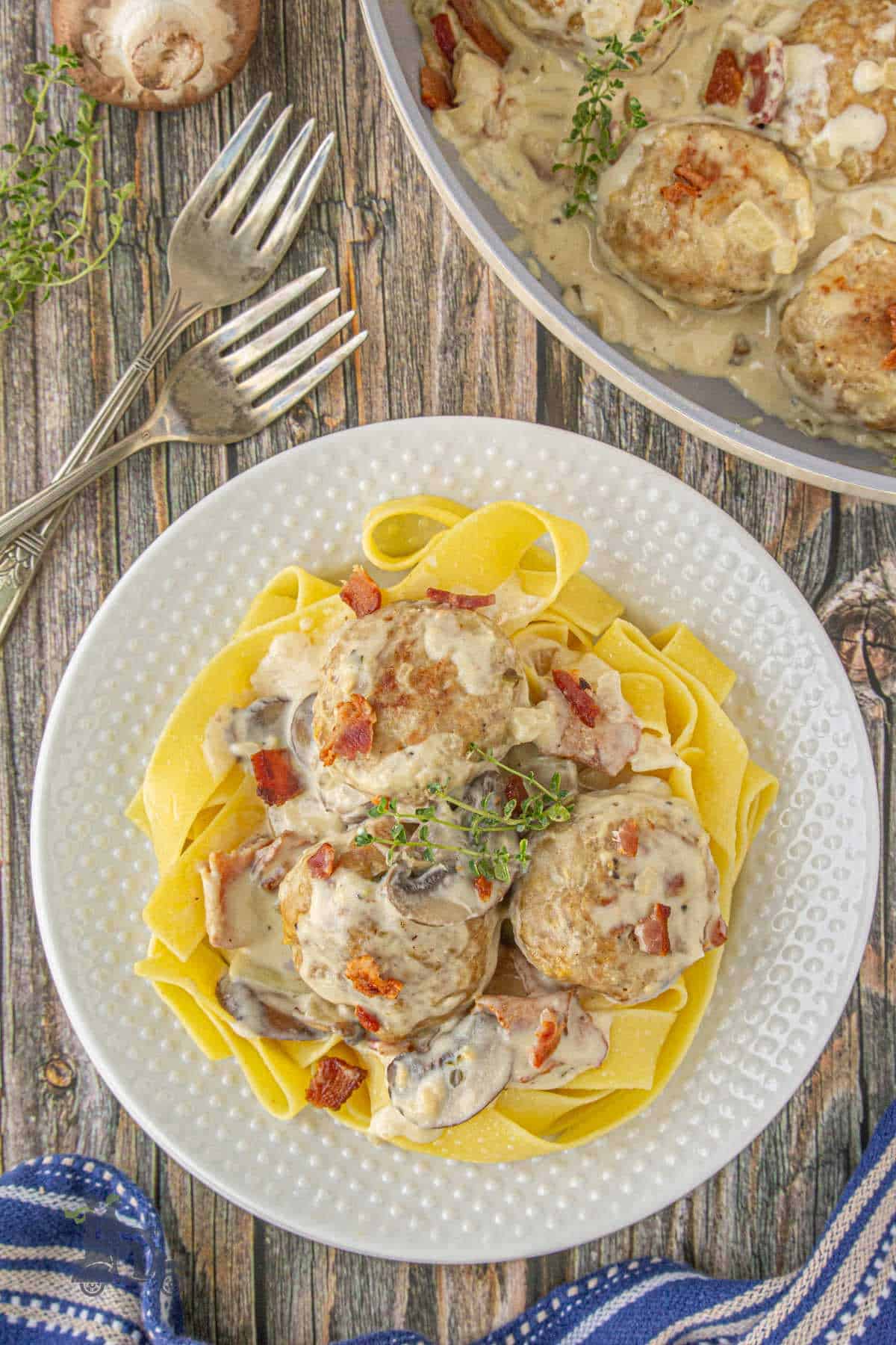 Coq au Vin Meatballs made with ground turkey over tagliatelle egg pasta.