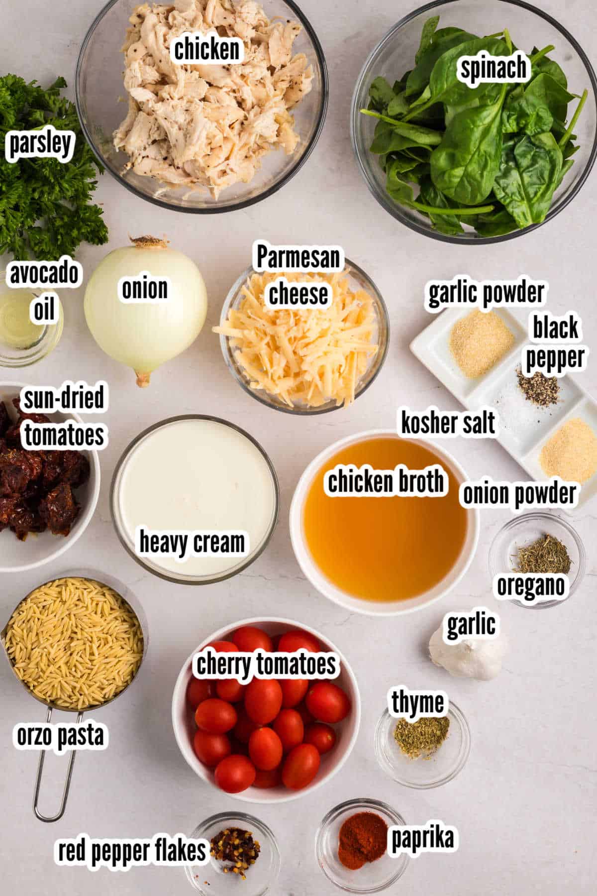 The ingredients needed to make the one pot Tuscan Chicken and pasta with Parmesan cheese. 