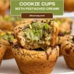 A Pinterest Pin with a title overlay features a chocolate cookie cup filled with pistachio cream and a bite taken out of the treat.