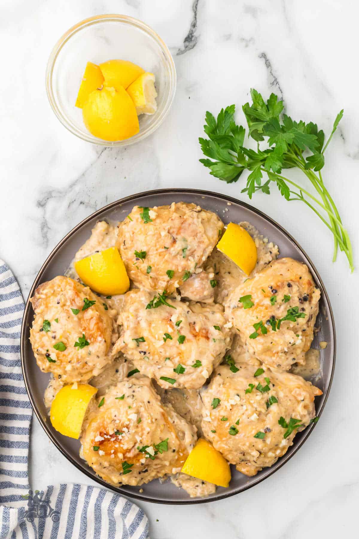 One skillet chicken thighs made with a creamy Italian cacio e pepe sauce.