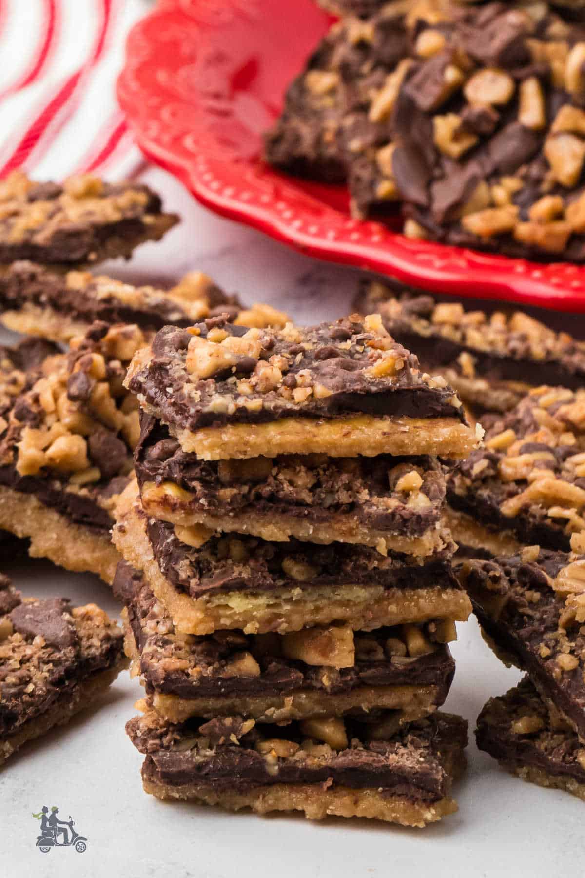 Piles of saltine cracker toffee bark ready to enjoy or give as a holiday gift.