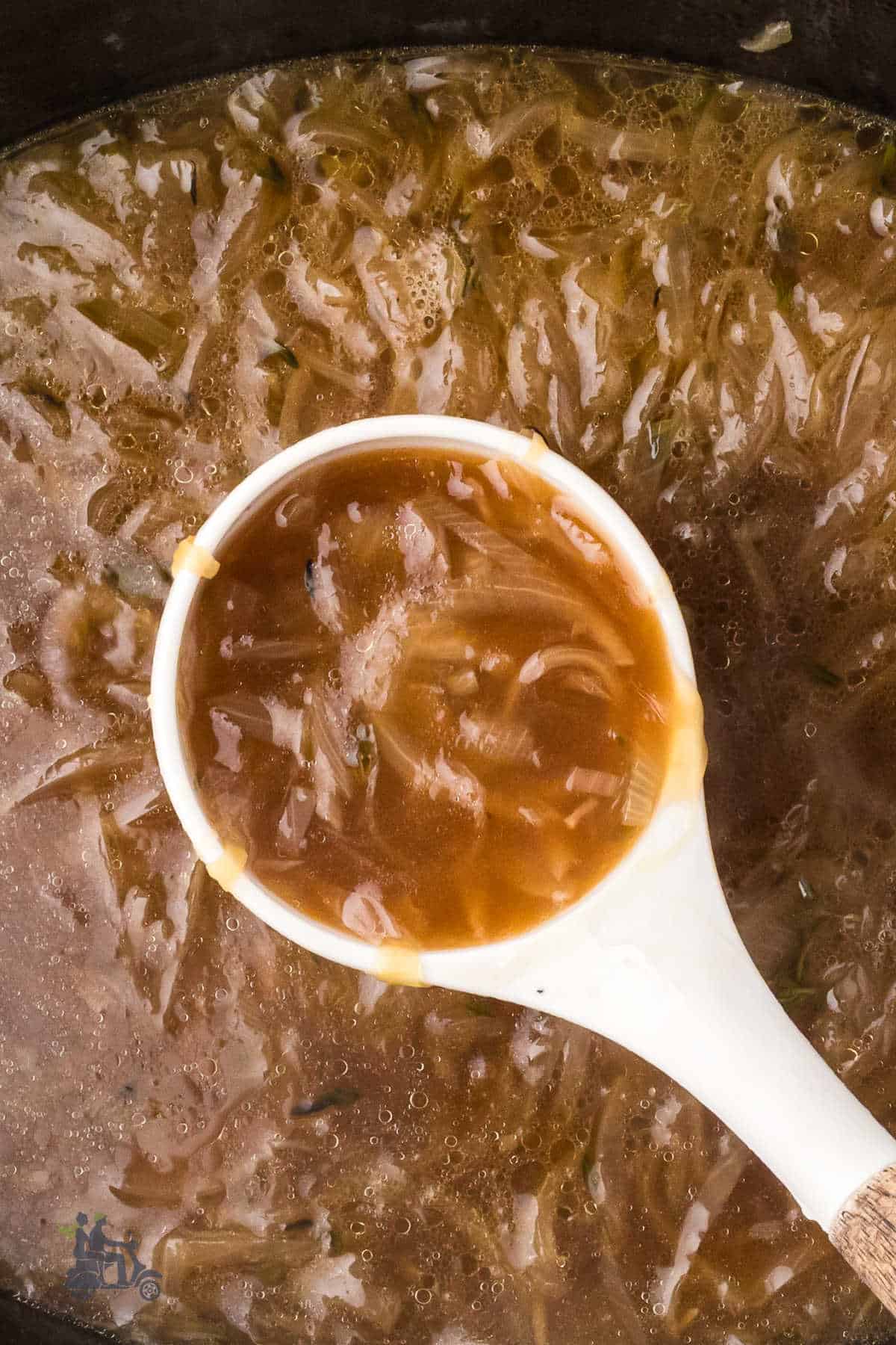 A slow cooker did the work of caramelizing the onions, then cooking the soup.  