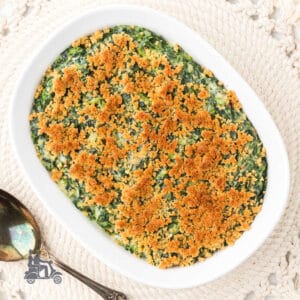 A baking dish filled with the spicy Spinach Madeline dish.