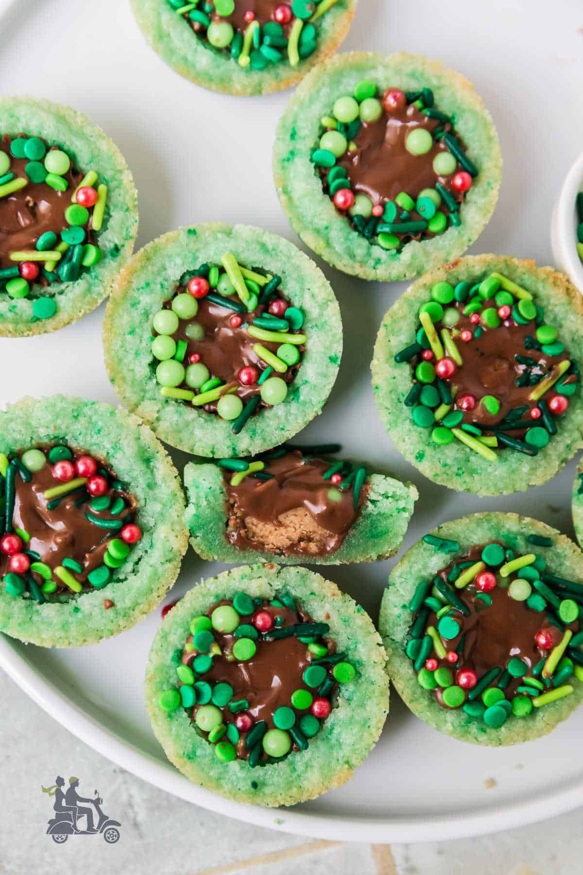 Overview of the Green Sugar Cookie Wreath with a Reese's Peanut Butter Cup with colorful sprinkles on top. 