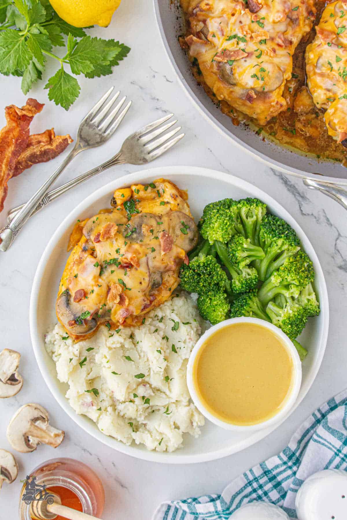 Overhead view of the Alice Springs Chicken recipe served with broccoli and mashed potatoes. 