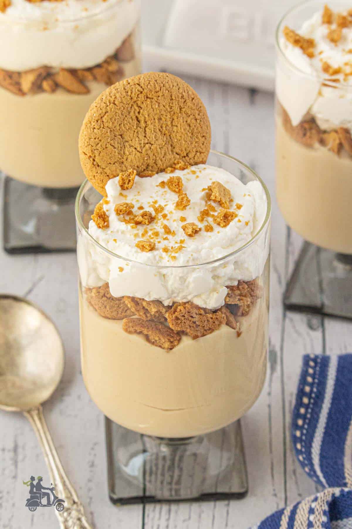Homemade butterscotch pudding parfait with spiced cookie crumble.