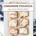 Homemade cinnamon roll focaccia cut into squares with buttery cinnamon filling.