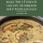 Creamy mushroom sausage soup in a brown bowl with a soup spoon in the broth.