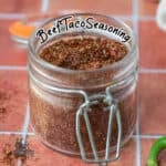 A jar filled with Beef Taco Mix, much like the El Paso Brand.