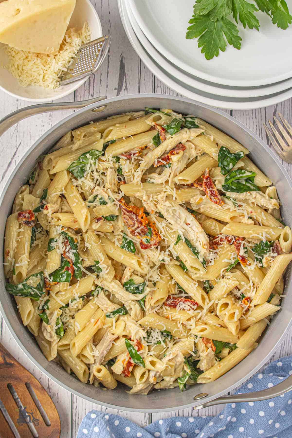 Pasta with roasted garlic and sun-dried tomato cream sauce. 
