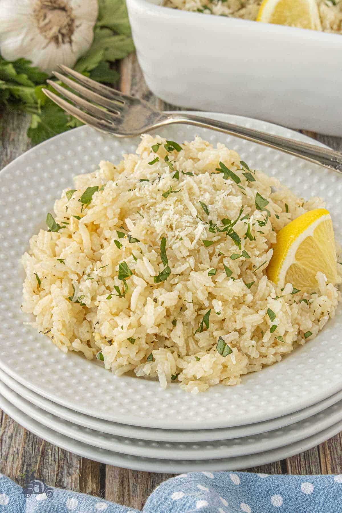 Oven-baked rice served on a white plate as a simple side dish.