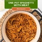 Overhead view of a Dutch oven filled with the finished spaghetti cooked in meat sauce recipe.