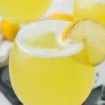 Summer happy hour beverage inspired by prosecco wine and limoncello for a summer spritz.