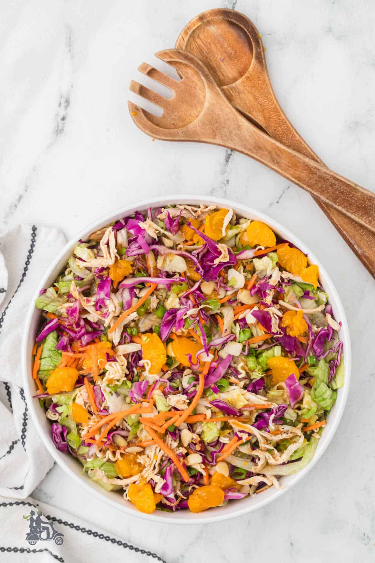 Fresh Asian-inspired chicken salad with romaine lettuce, cabbage, mandarn oranges, and crispy ramen noodles.
