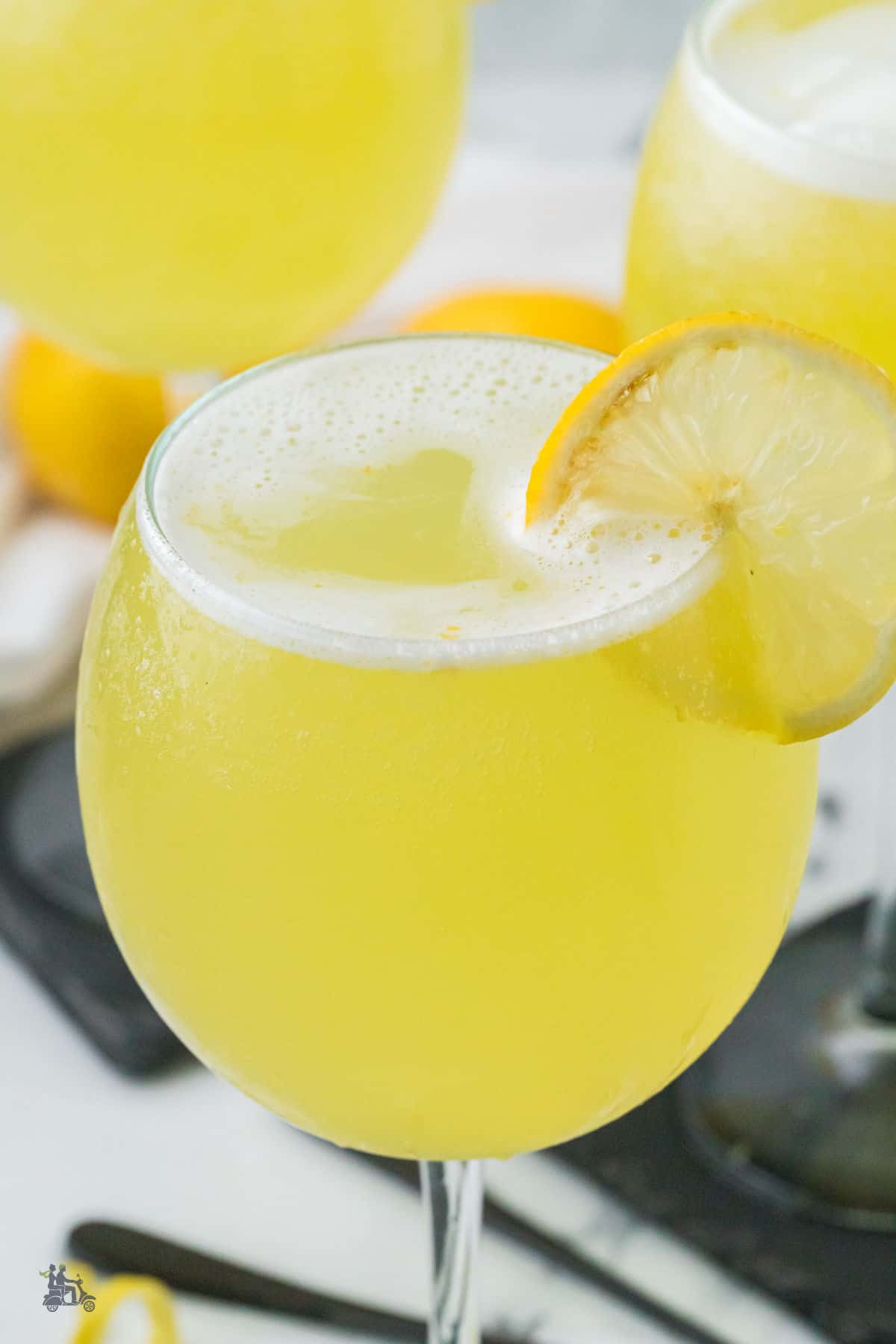 Lemon sorbet melting into bubbly Prosecco and limoncello.