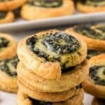 Easy Spinach puff pastry appetizers stacked and ready to serve.