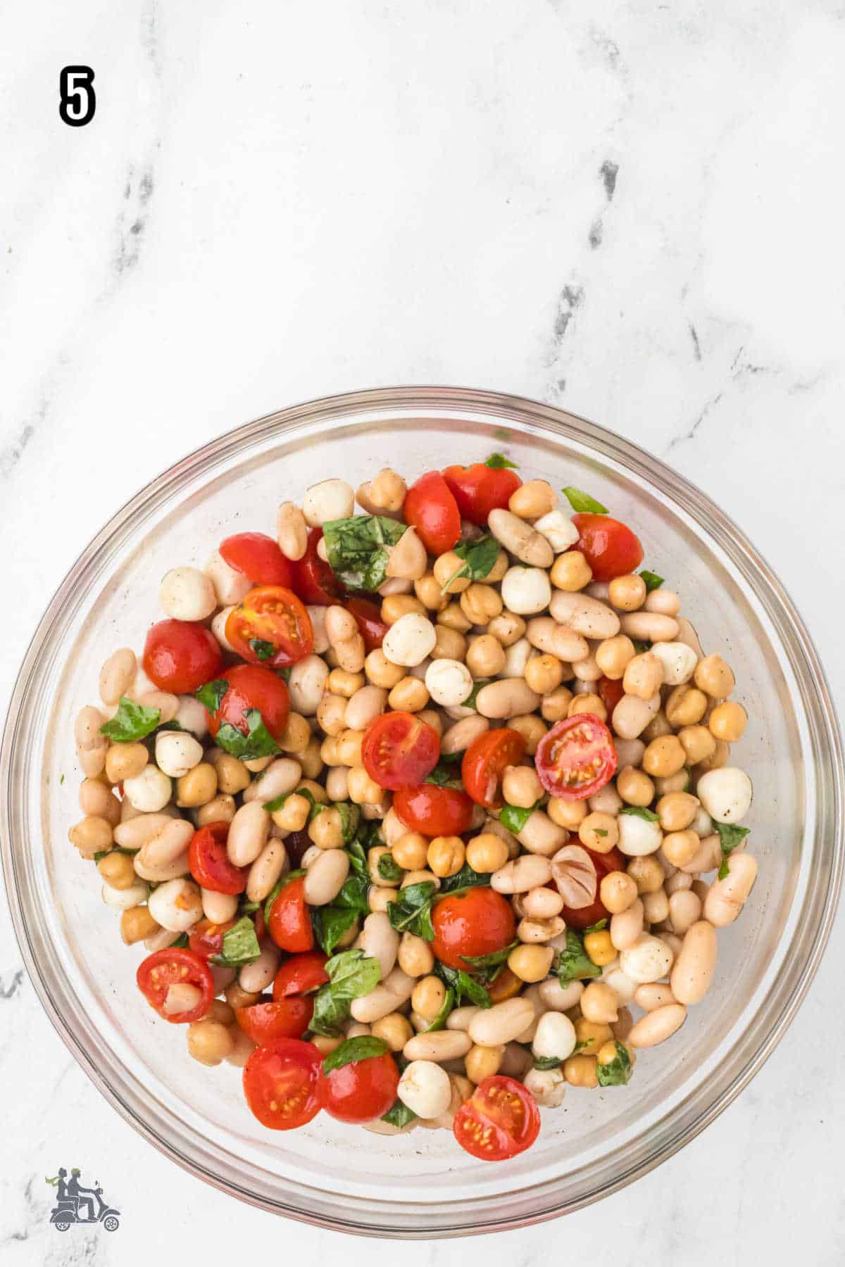Chickpeas and cannellini beans added to the balsamic dressing for the Dense Bean Salad recipe.