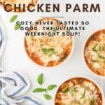 Chicken Parm soup in white bowls with fresh basil and melted mozzarella cheese.