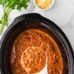 Crockpot bolognese meat sauce made with beef, tomatoes, wine, and cream.