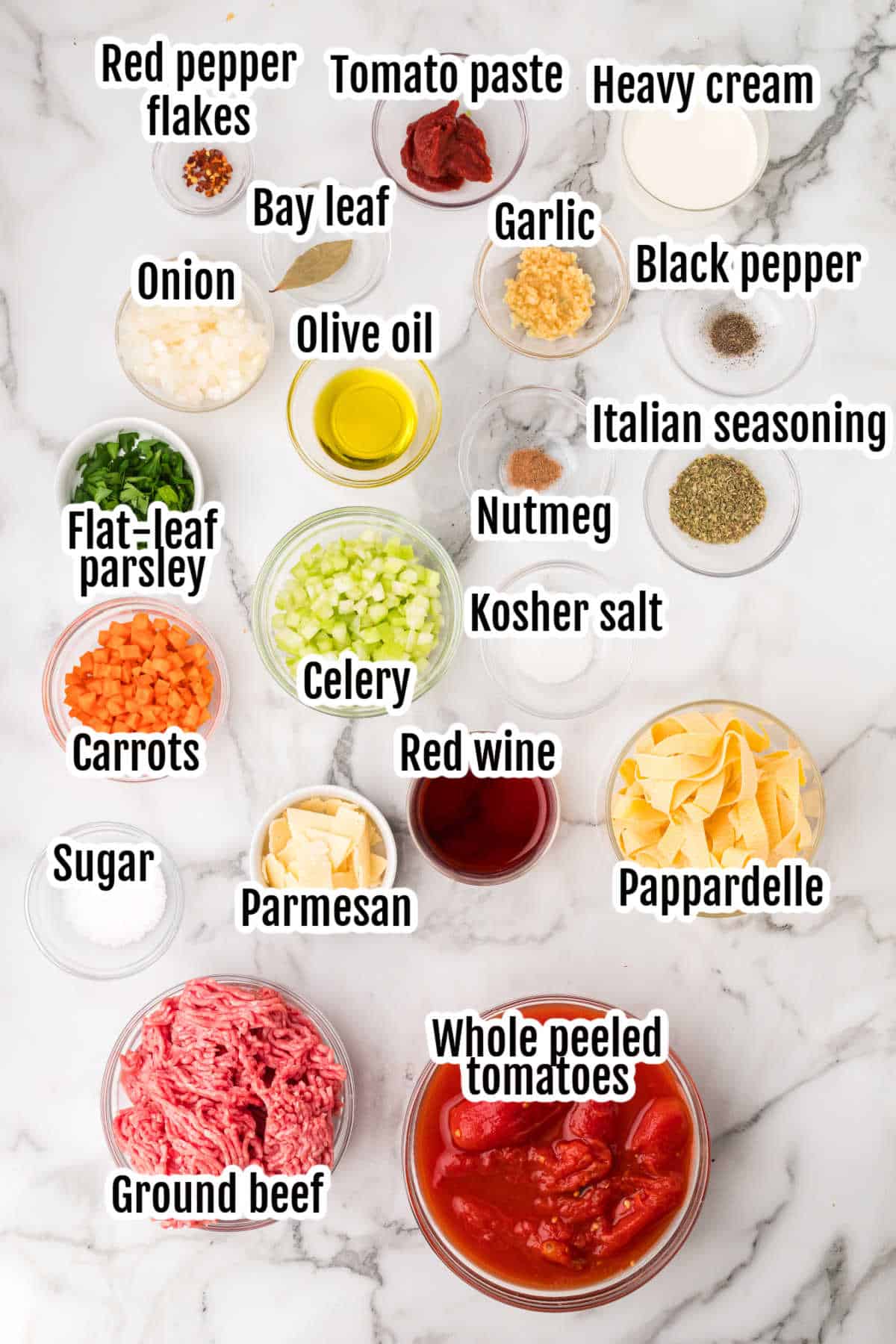 The ingredients needed to make the hearty Italian meat sauce recipe in a slow cooker.
