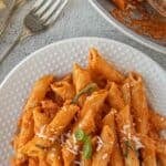 Silky smooth vodka sauce dress penne pasta for a family-friendly dinner that is company-worthy.