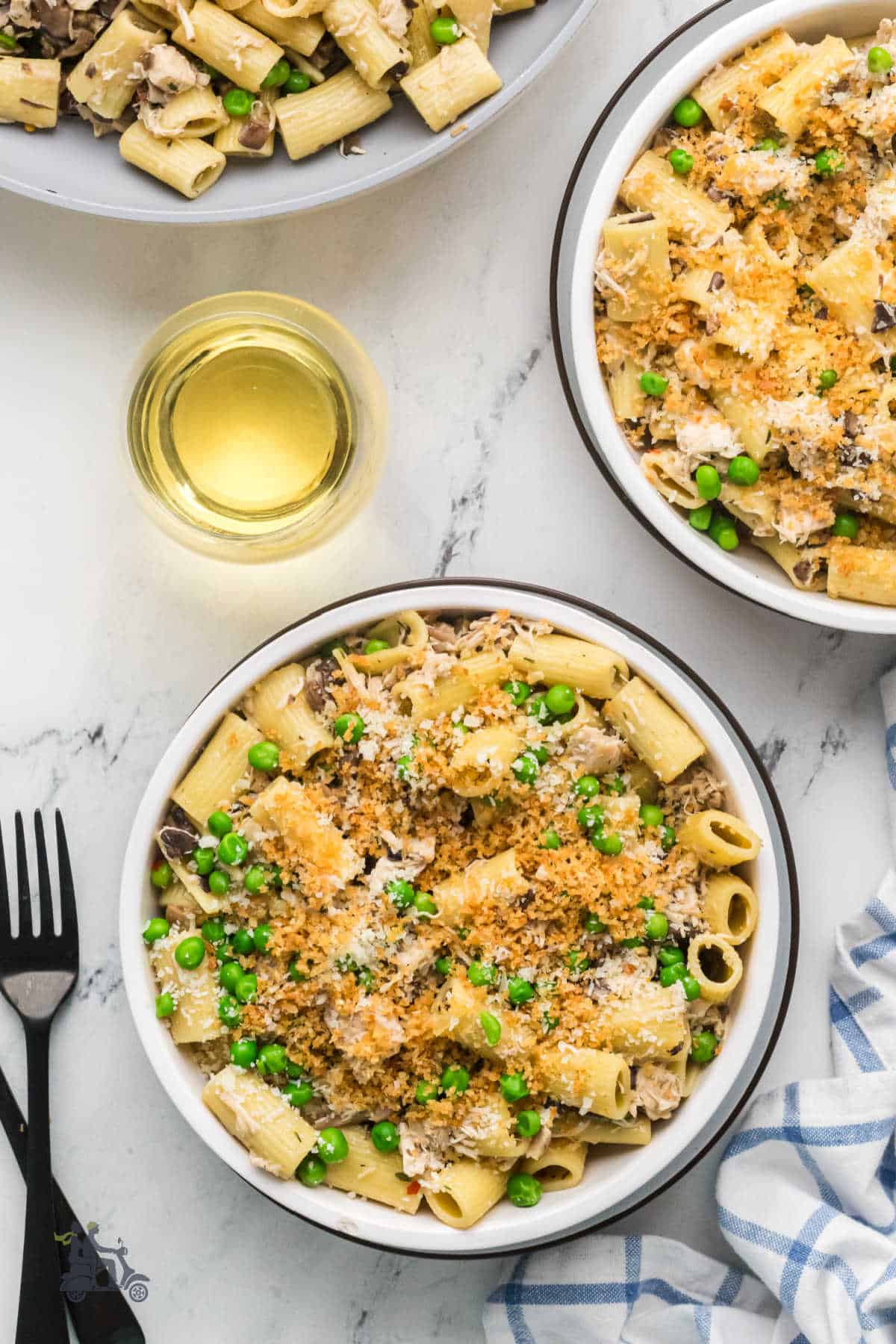 Overhead view of an easy weeknight dinner consisting of rotisserie chicken made into a stovetop tetrazzini recipe.