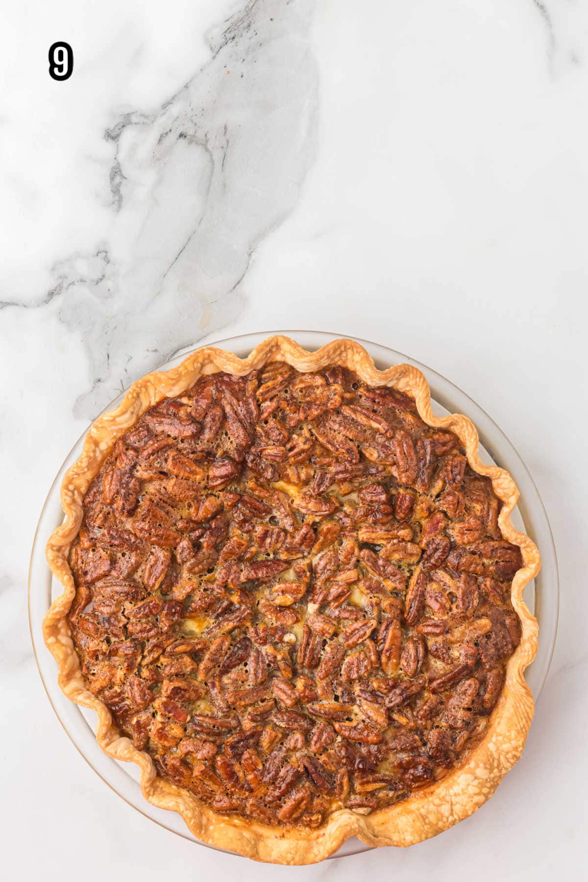The finished pecan pie with cream cheese layer and refrigerated crust.