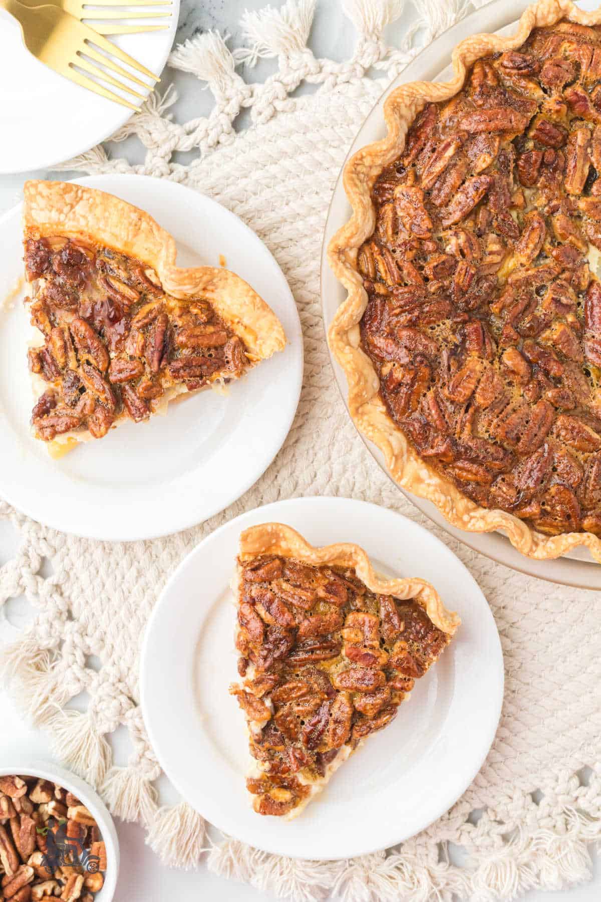 A special two pies in one; pecan pie and cheesecake to make a creamy cheesecake pecan pie. 