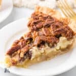 A pecan pie with a cheesecake layer, which is an ideal holiday dessert.