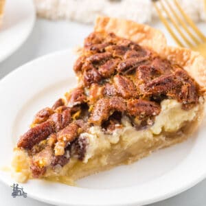 A pecan pie with a cheesecake layer, which is an ideal holiday dessert.