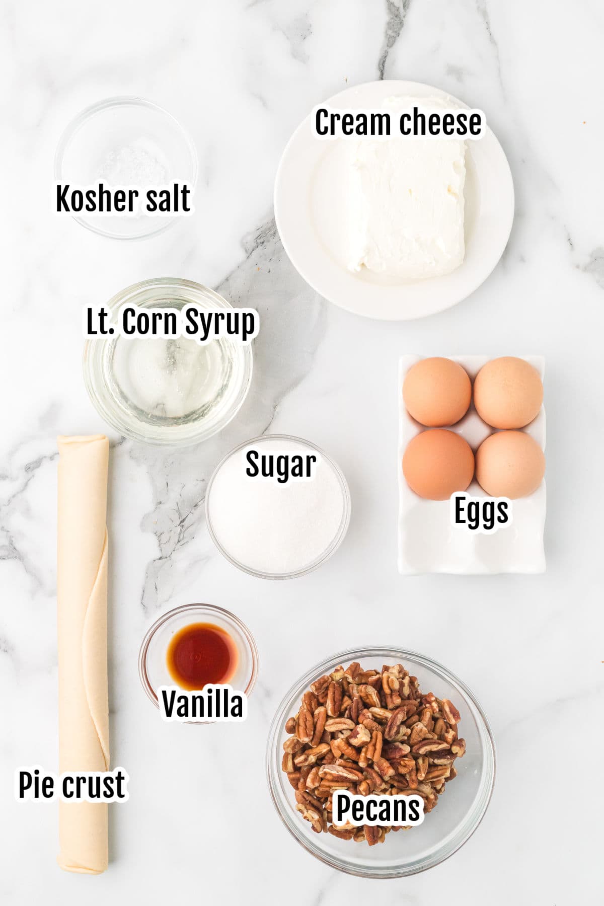 The ingredients needed to make a cheesecake-and-pecan-pie combination.