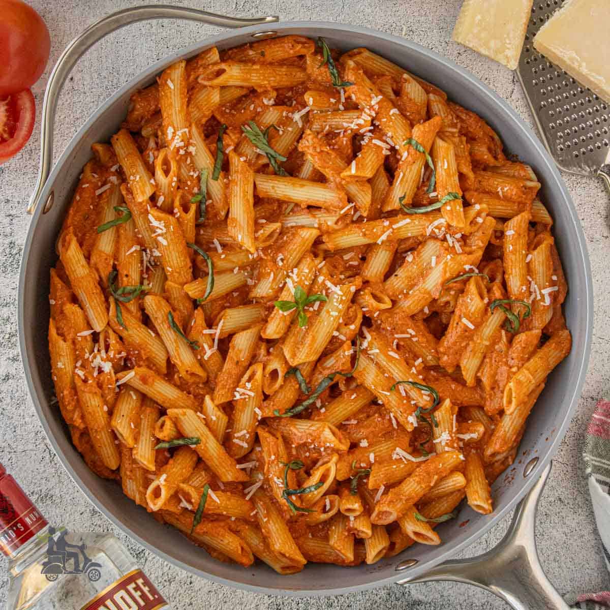 Creamy penne alla vodka coated in homemade San Marzano tomato sauce and topped with Parmesan and basil.