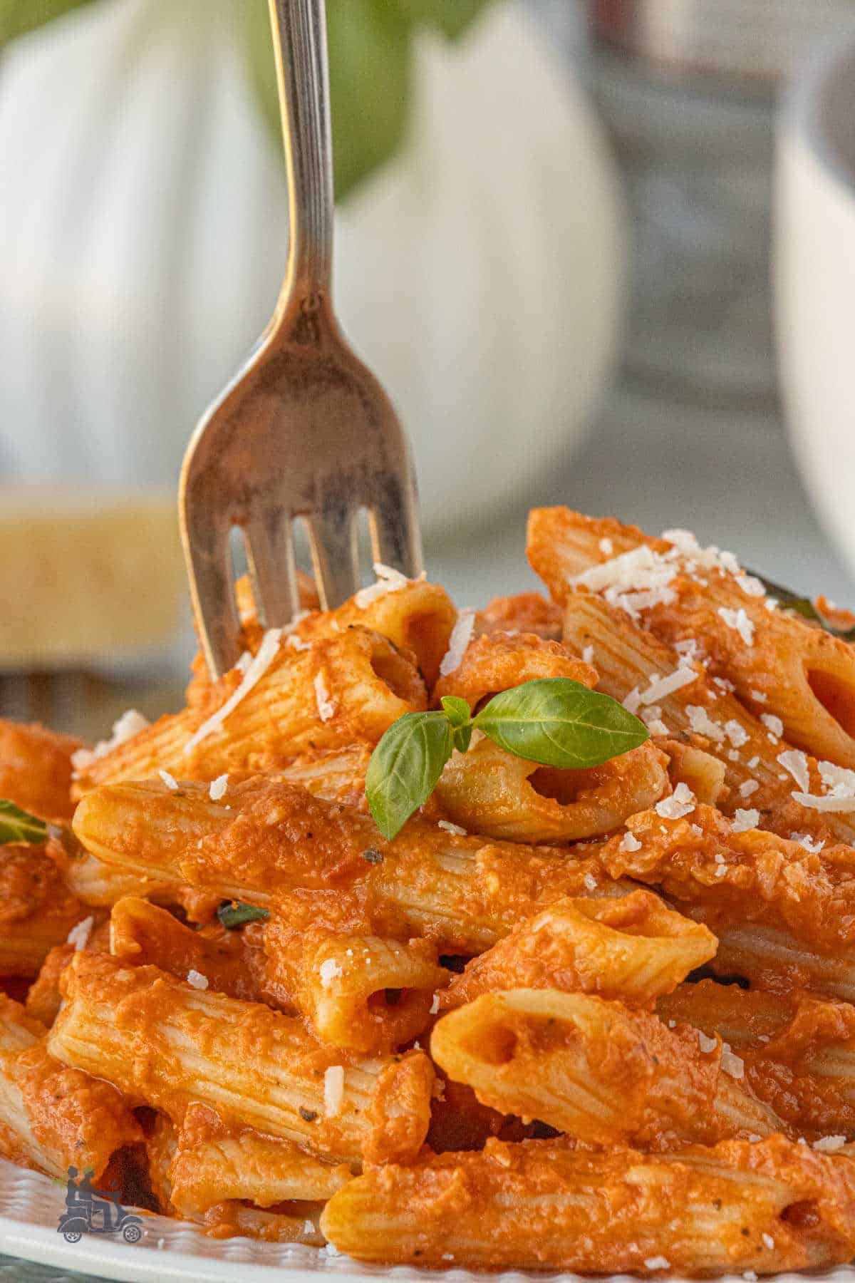 Italian-American penne alla vodka made with tomatoes, cream, Parmesan, and fresh herbs.